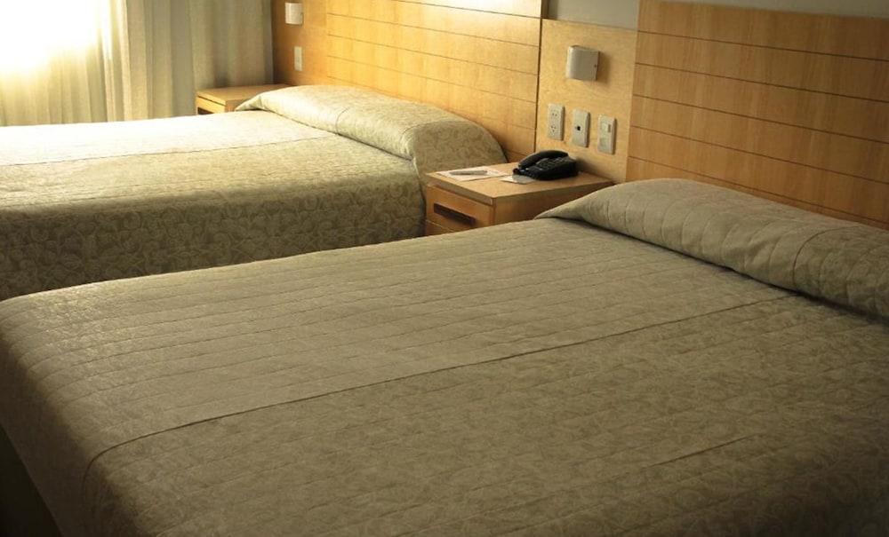 Hotel Atlantico Tower Rio de Janeiro Buitenkant foto Two beds in a hotel room